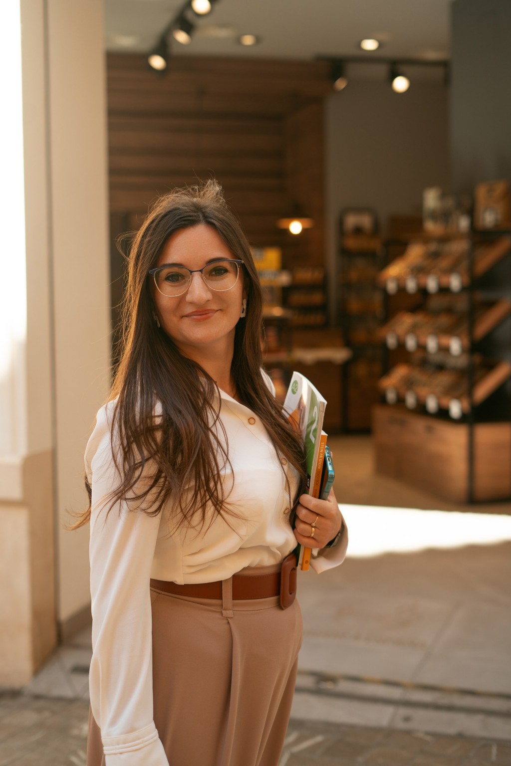 Mariana standing in a Spanish city, founder of iSpeakHub